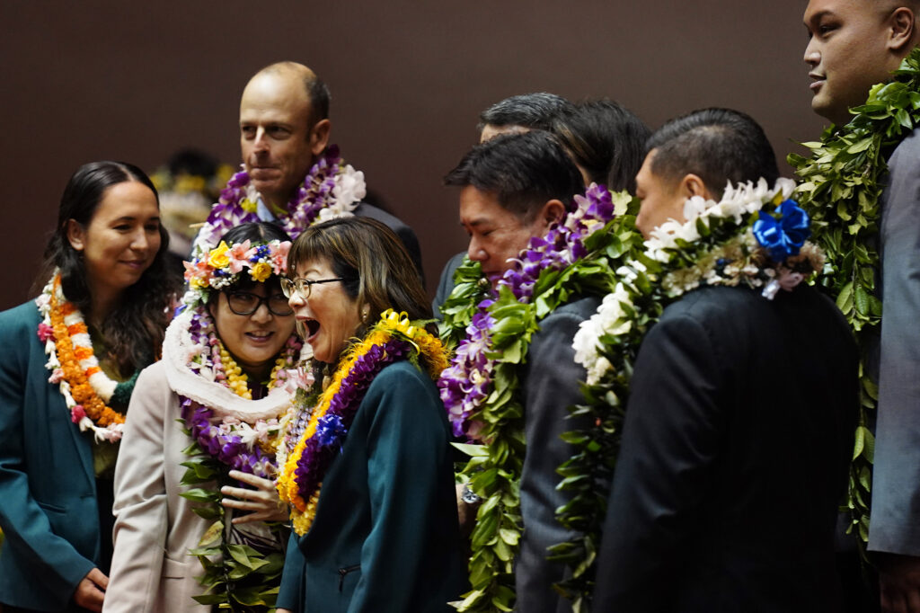 Speaker of the House Nadine Nakamura gets a laugh out of a group photo after the Hawaiʻi State Legislature opening day Wednesday, Jan. 21, 2026, in Honolulu. (Kevin Fujii/Civil Beat/2026)