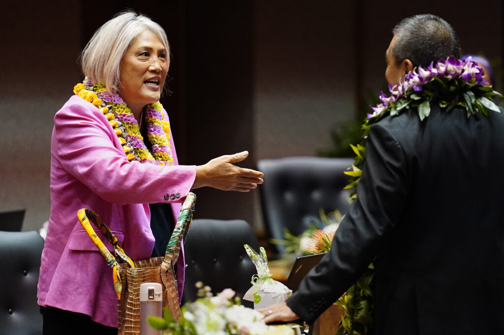 Rep. Kim Coco Iwamoto talks story after the Hawaiʻi State Legislature opens Wednesday, Jan. 21, 2026, in Honolulu. (Kevin Fujii/Civil Beat/2026)