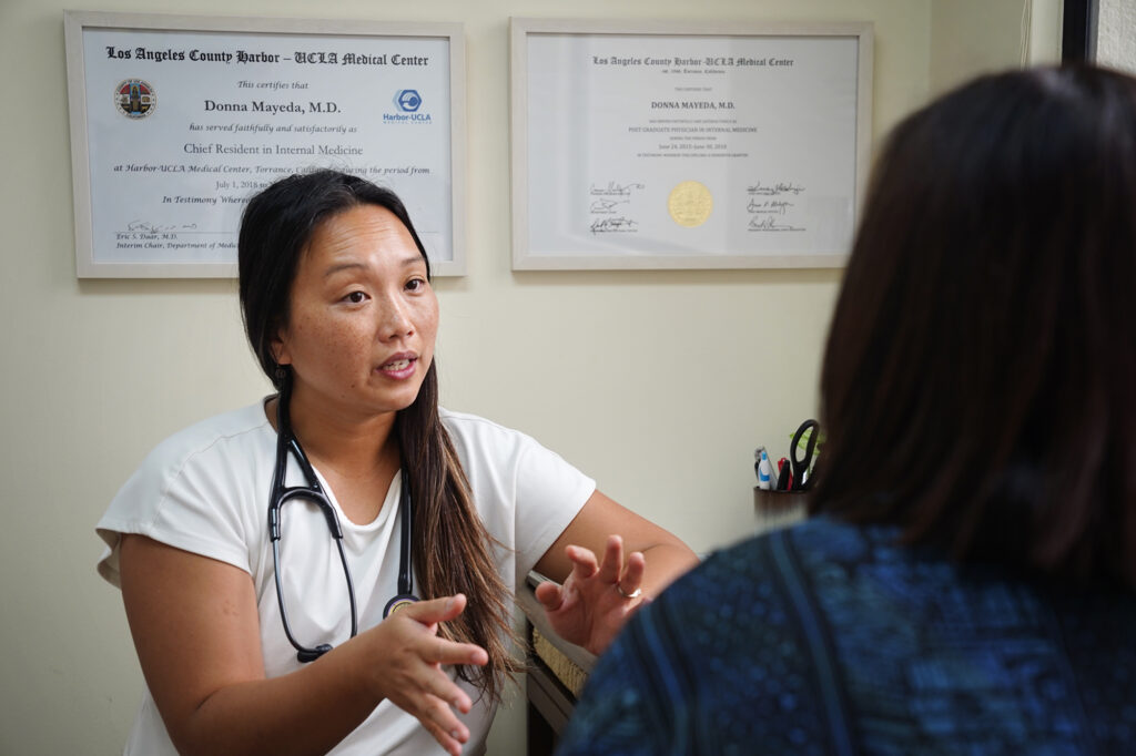 Dr. Donna Mayeda meets with patient Regina Yoshimori Monday, Feb. 2, 2026, in Honolulu.  (Kevin Fujii/Civil Beat/2026)