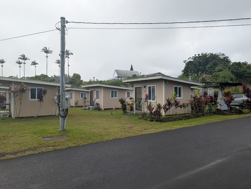 Rows of newly built units at the Sacred Heart Affordable Housing Project in Pāhoa, a HOPE Services Hawaiʻi development providing permanent supportive housing for seniors, including veterans. (Will Bailey/Civil Beat/2026)