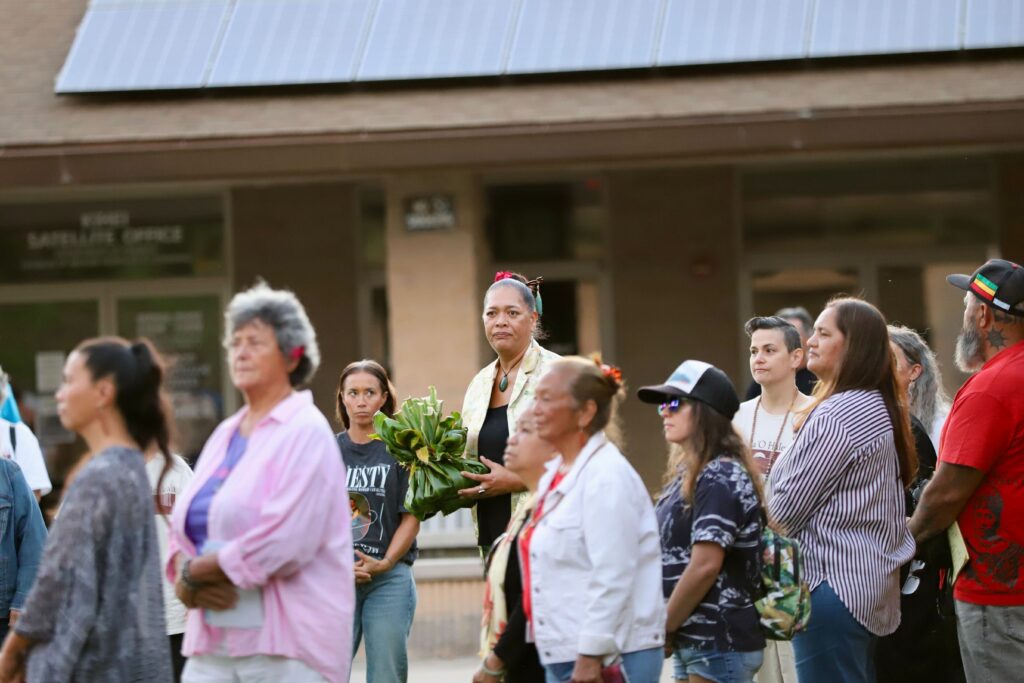 Dozens of people gathered for a  prayer circle led by Pūlama Collier outside of the Kīhei Community Center on Tuesday night, ahead of a public hearing about the U.S. Department of Air Force's plans to construct seven new telescopes near the summit of Haleakalā. Dozens of people emotionally testified in opposition of the project. (Erin Nolan/Civil Beat/2026)