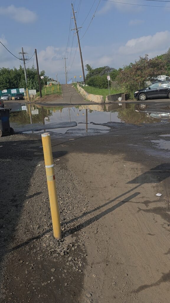 Photo showing flooding on Hekaha Street on a section of the Pearl Harbor Bike Trail
