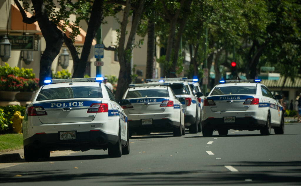 Honolulu Police Department vehicles on Kalakaua Blvd. across from the Waikiki sub-station, photographed Tuesday, March 3, 2026. (Craig Fujii/Civil Beat/2026)