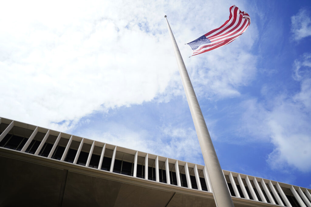 Flags in front of the Hawaiʻi State Capitol are lowered to half staff to honor Congresswoman Colleen Hanabusa Friday, March 6, 2026, in Honolulu.