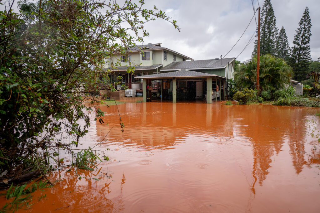 Another property on Waialua Beach Road with flooded grounds March 20, 2026. Saturated ground and more rain from an on-going storm system caused flooding to Waialua and Haleiwa overnight. (Craig Fujii/Civil Beat/2026)