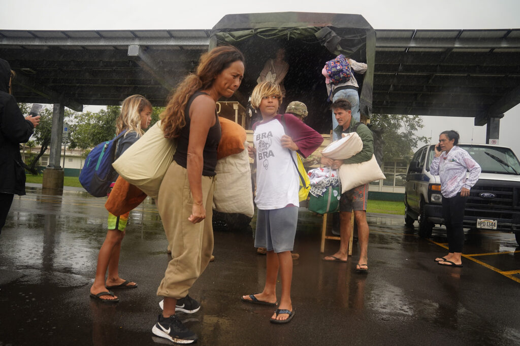 North Shore residents evacuate to Leilehua High School after a Kona Low storm flooded Haleʻiwa and Waialua Friday, March 20, 2026, in Wahiawā. (Kevin Fujii/Civil Beat/2026)