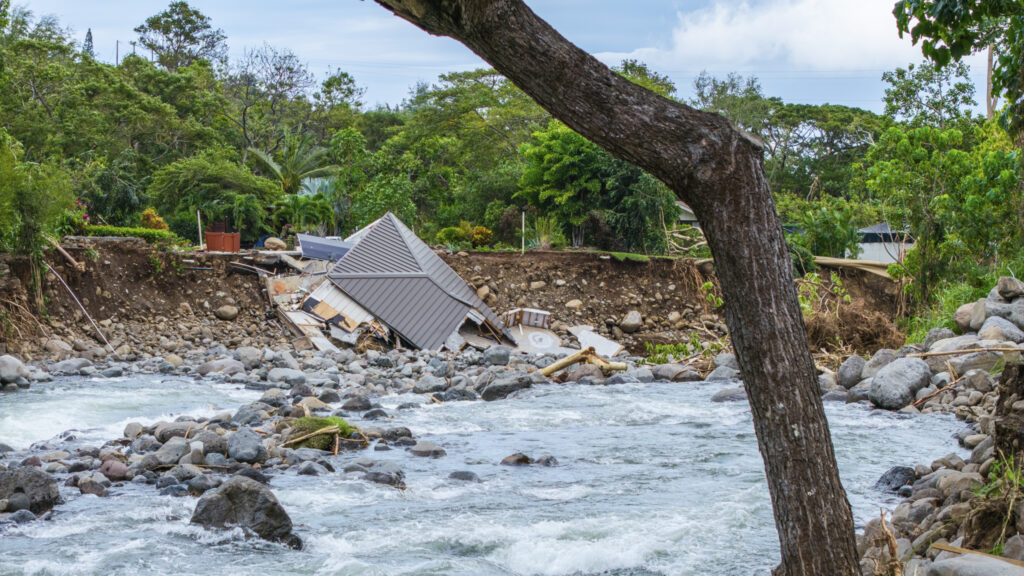 A home collapsed into a stream on Maui during the flooding from a Kona low storm the weekend of March 14, 2026. (Sean Hower/Civil Beat/2026)