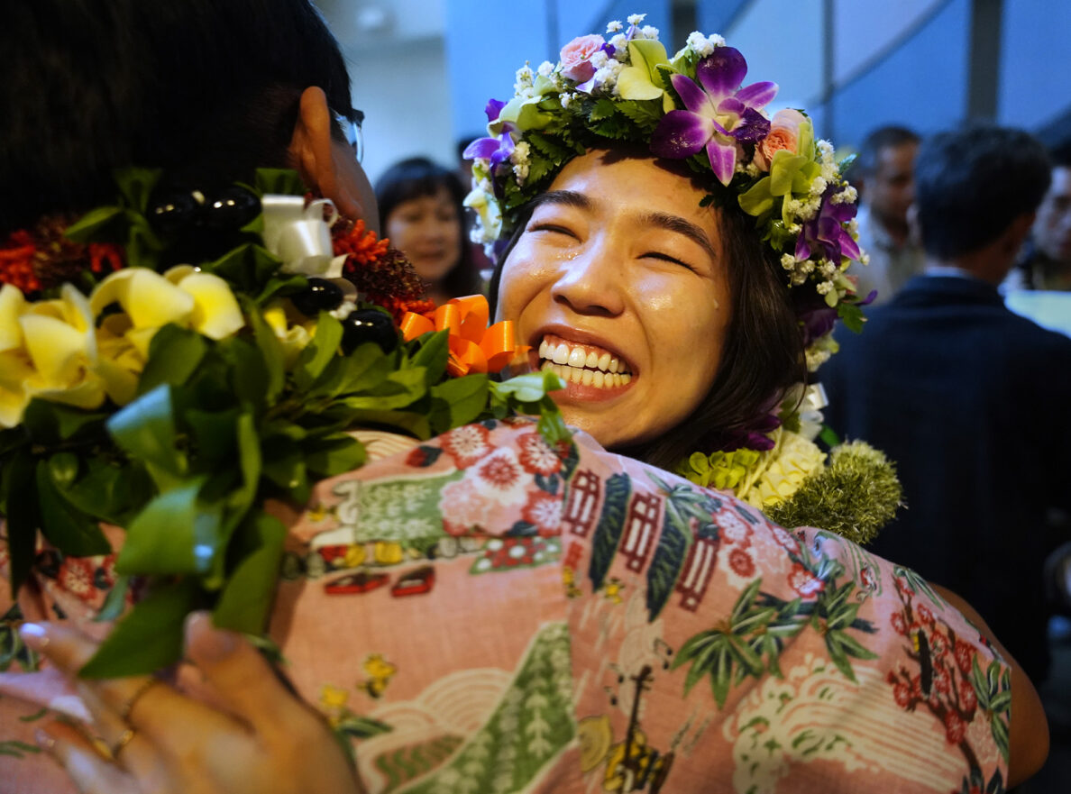 John A. Burns School of Medicine fourth-year students Jamie Emoto hugs Chad Taniguchi after opening their letters on “Match Day” Friday, March 20, 2026, in Honolulu. Emoto, of Lihue, will continue training in pediatrics at UC Irvine Medical Center. Taniguchi is going into emergency medicine at Lehigh Valley Hospital in Pennsylvania. (Kevin Fujii/Civil Beat/2026)