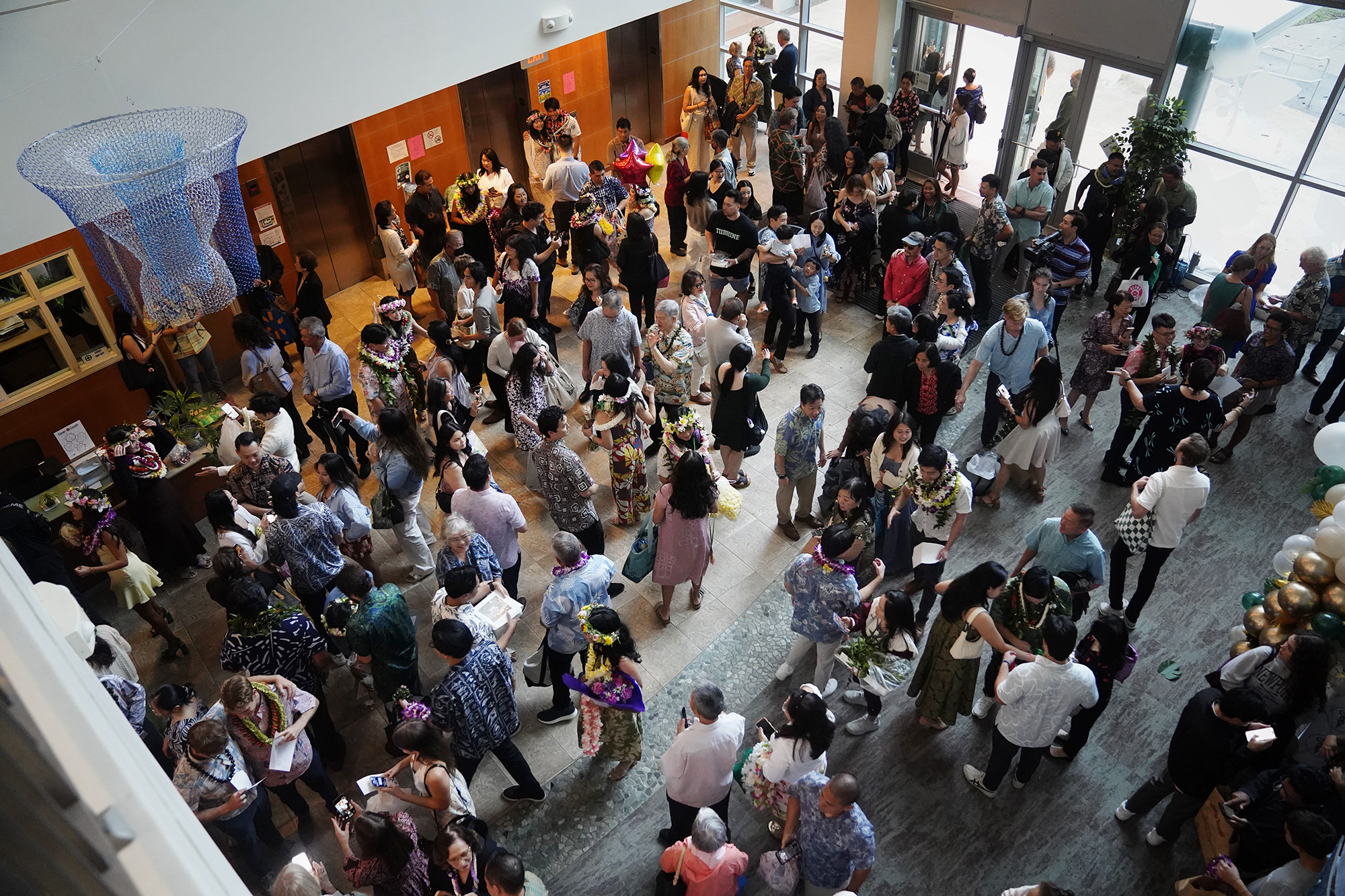 John A. Burns School of Medicine fourth-year students and their families mingle after opening their letters for “Match Day” Friday, March 20, 2026, in Honolulu. (Kevin Fujii/Civil Beat/2026)