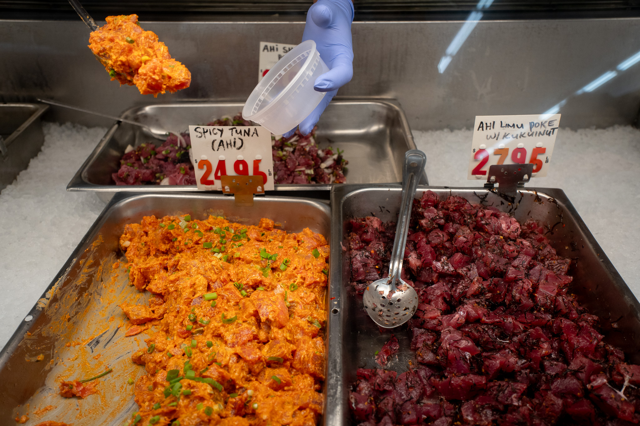 Half pound of spicy ahi is served up at Tamashiro Market April 3, 2026. The famous Kalihi store is closing April 30th after 85 years in business.