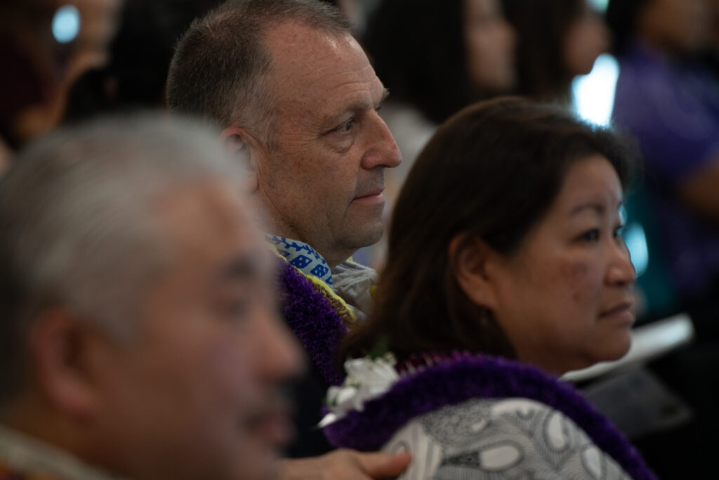 Gov. Josh Green and First Lady Jaime Green listen to speakers at an educational event for Hawaii high school students at JABSOM April 7, 2026. (Craig Fujii/Civil Beat/2026)