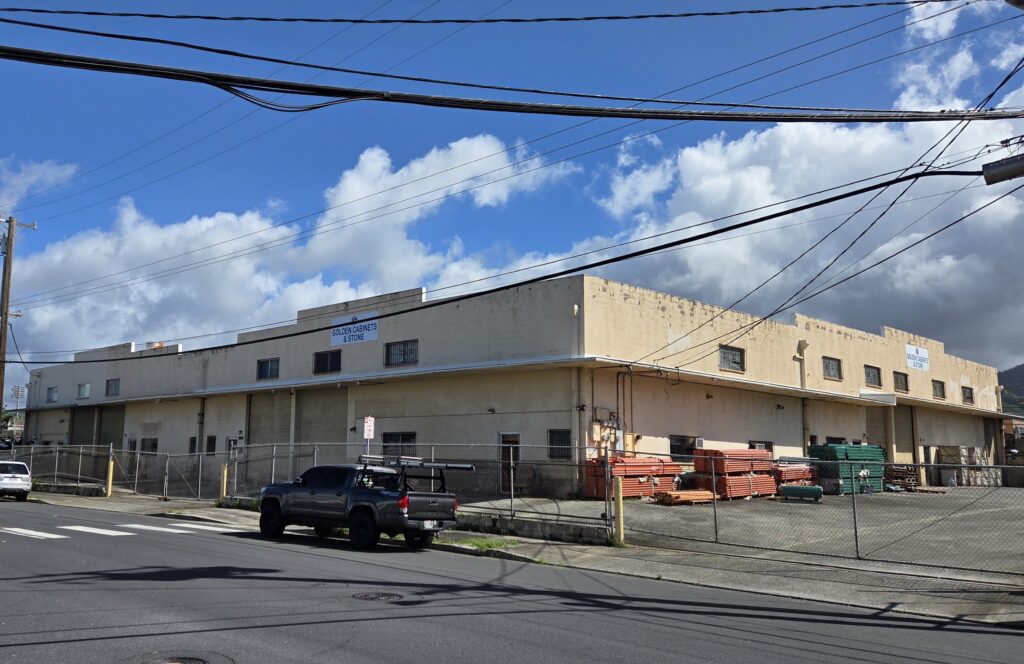 The Golden Cabinets & Stone warehouse on Mookaula Street where Zhenxiong Lin was struck by a falling plank during a renovation project.