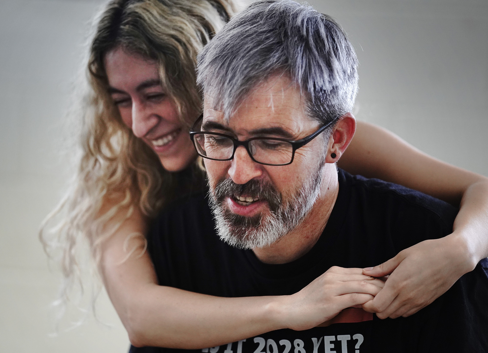 Miriam Yazdanpanahi and unarmed stage combat teaching assistant Andrew Simmons share a light moment during class Saturday, April 11, 2026, at Manoa Valley Theatre in Honolulu. Jasmine Haley Anderson is a certified instructor through Dueling Arts International. (Kevin Fujii/Civil Beat/2026)