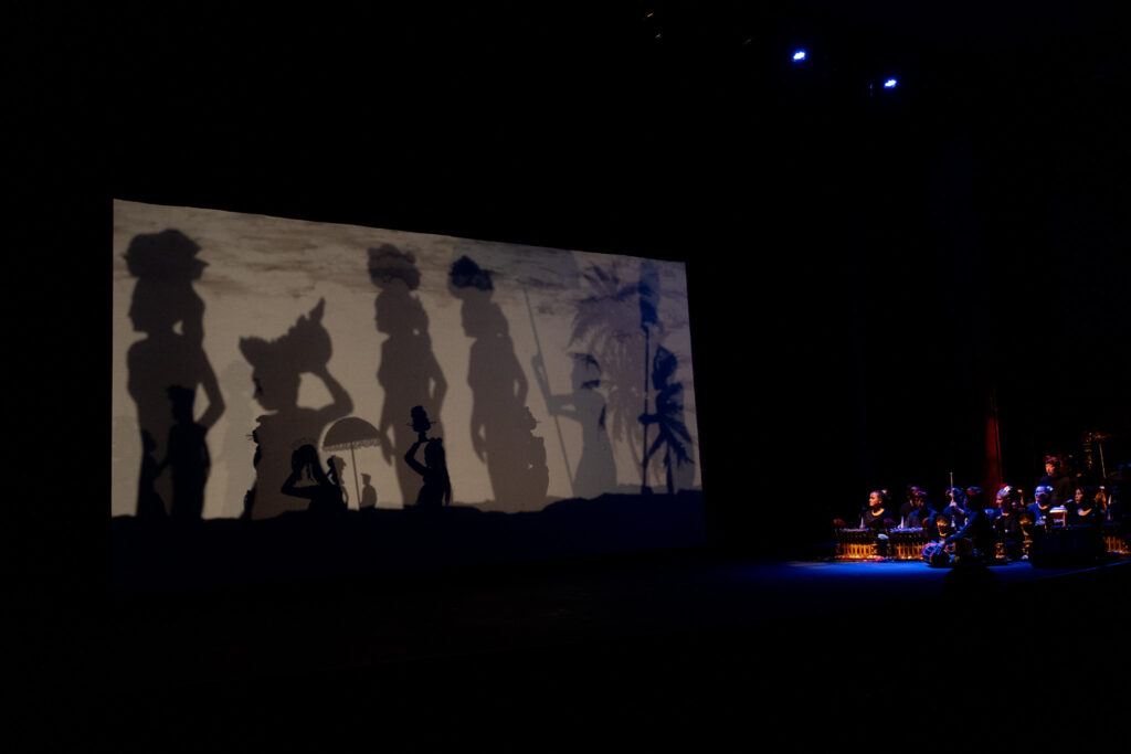 A series of showing moving shadow puppets moving on a screen during a Balinese style production at UH Manoa April 16, 2026. (Craig Fujii/Civil Beat/2026)