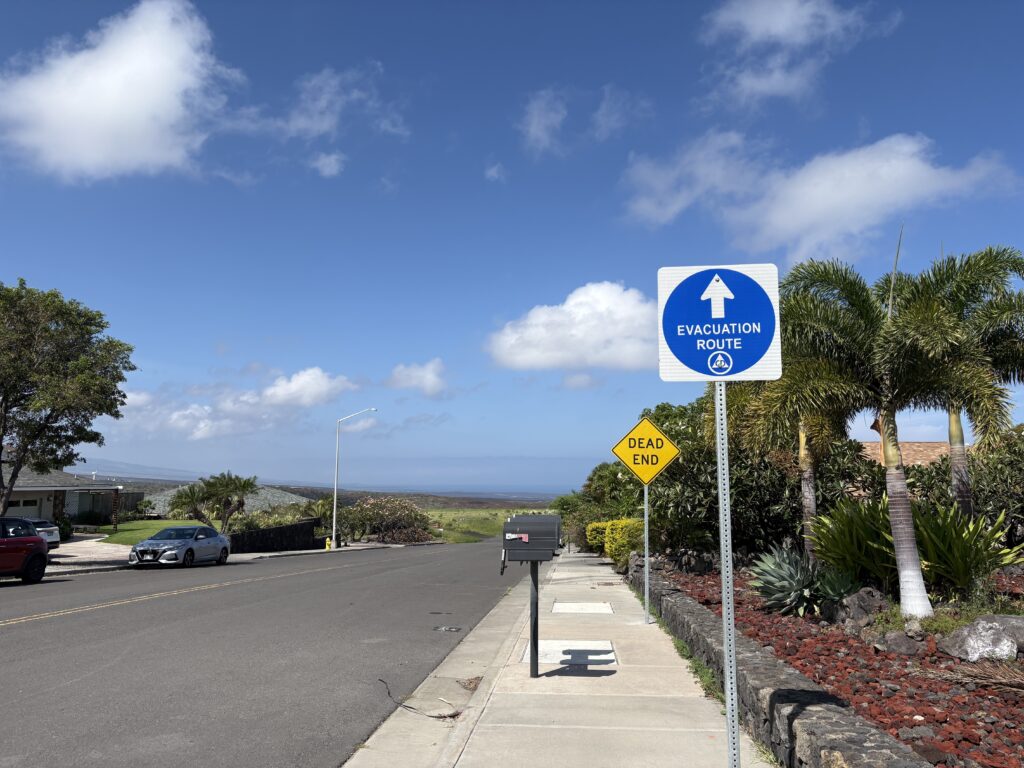 Waikōloa Village has just two ways out, the main road, Waikōloa Road, and a one way emergency egress. (Taylor Nāhulukeaokalani Cozloff/Civil Beat/2026)