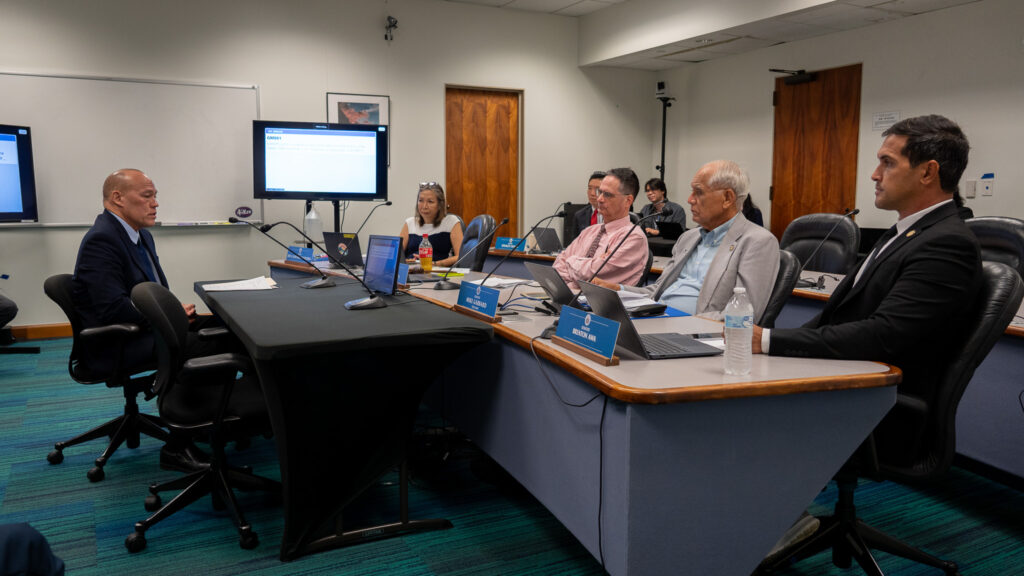Hawai'i Supreme Court Chief Justice nominee Vladimir Devens, left, with members of the Senate Judiciary Committee at the Capitol April 22, 2026. From left are Senators Brenton Awa, Mike Gabbard, chair Karl Rhoads and Joy San Buenaventura. (Craig Fujii/Civil Beat/2026)