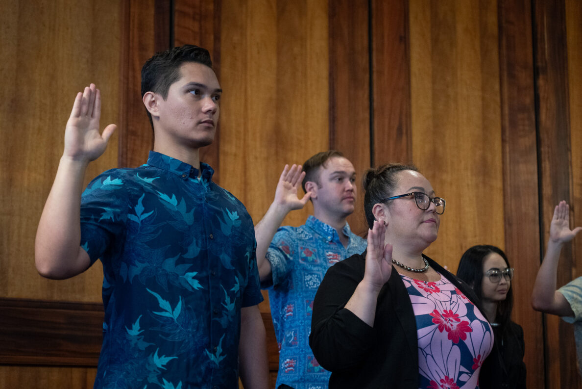 Henderson Huihui, left, and Kirsha Durante participate in Law Day at Ali'iolani Hale May 1, 2026. The event, sponsored by the Hawaiʻi State Bar Association, also took place in Maui, Lānaʻi and Hawaiʻi. Huihui and Durante are with the Native Hawaiian Legal Corporation. (Craig Fujii/Civil Beat/2026)