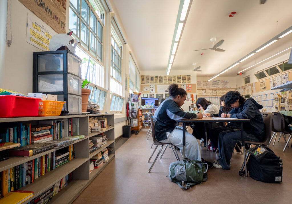 Students working without devices during a class at McKinley High School May 1, 2026. At left is Jude Marengo, and at right Lian (cq) Adamana. (Craig Fujii/Civil Beat/2026)