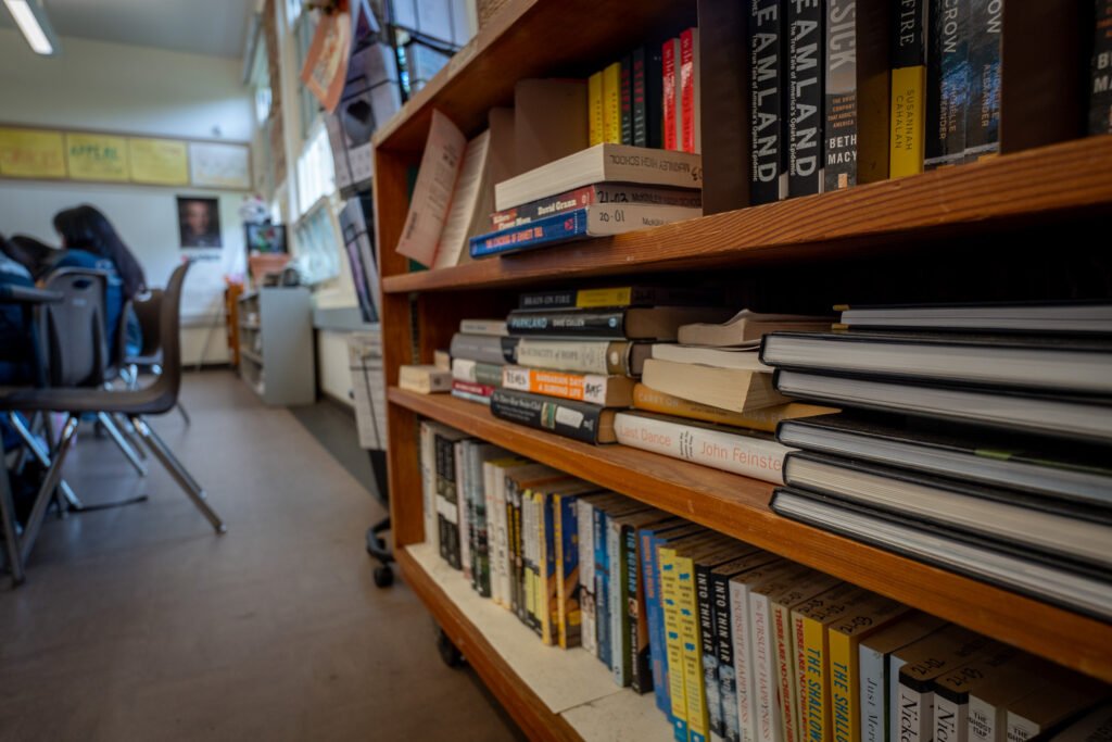 A bookshelf at a McKinley High School classroom May 1, 2026. (Craig Fujii/Civil Beat/2026)