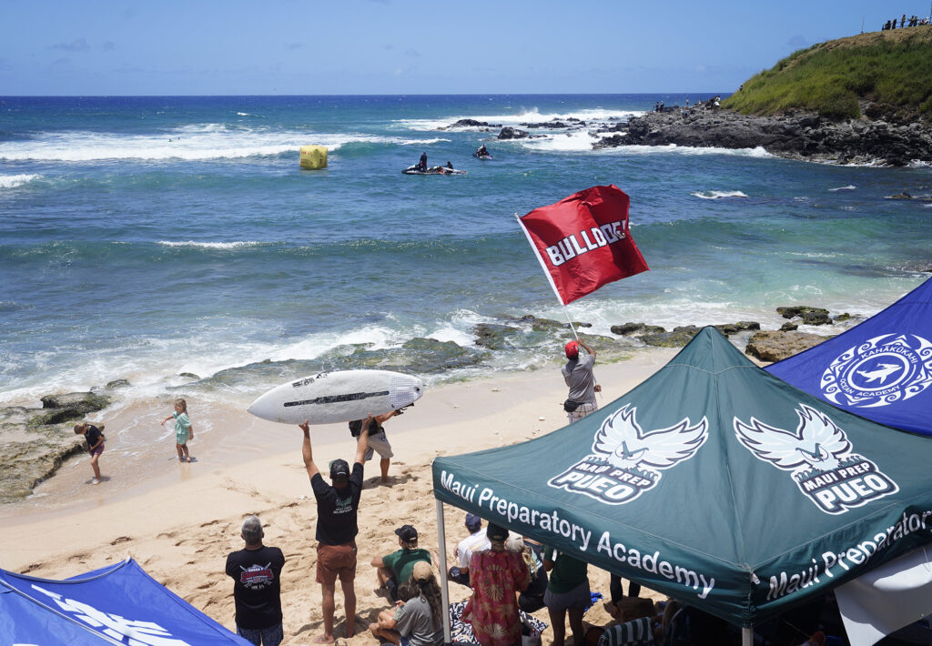 Teams set up at Hoʻokipa Beach Park for the inaugural Hawaiʻi High School Athletics Association surfing championships Saturday, May 2, 2026, in Pāʻia. (Kevin Fujii/Civil Beat/2026)