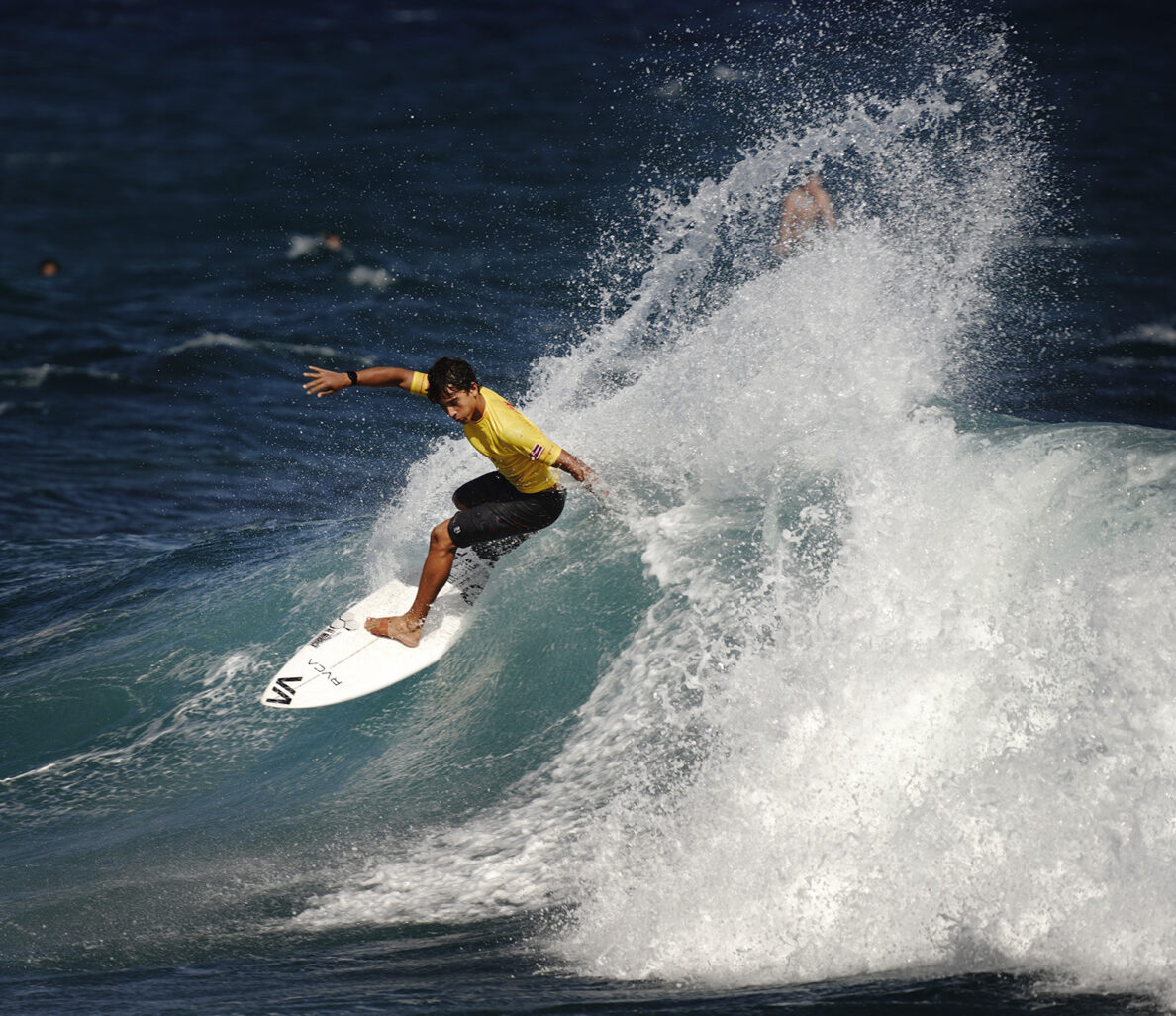Kahlil Pineres-Schooley of Seabury Hall competes in the boys shortboard semifinals of the inaugural Hawaiʻi High School Athletics Association surfing championships Saturday, May 2, 2026, at Hoʻokipa Beach Park in Pāʻia. Pineres-Schooley was later crowned the boys shortboard champion. (Kevin Fujii/Civil Beat/2026)