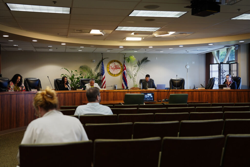 Hawaiʻi County Council members wait for a meeting to begin Tuesday, May 5, 2026, in Hilo. (Kevin Fujii/Civil Beat/2026)