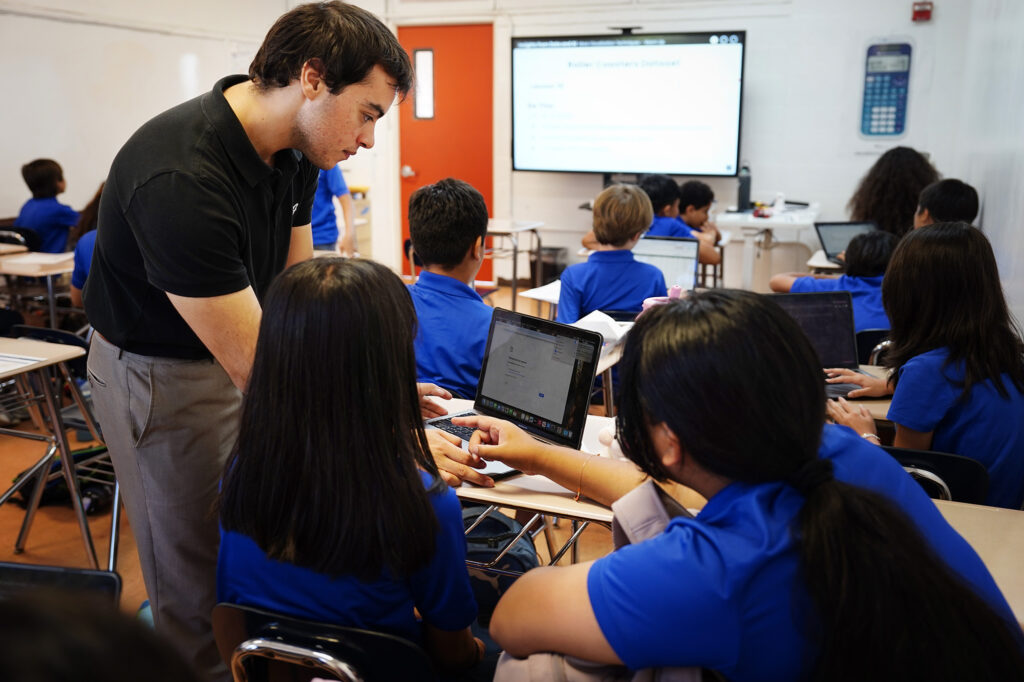 Kūlia Academy math and AI/data science teacher James Morice works with students Thursday, May 7, 2026, in Honolulu. (Kevin Fujii/Civil Beat/2026)
