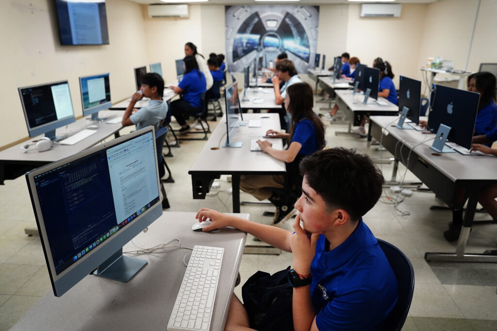 Kūlia Academy seventh grader Rodrigo Nava works on a coding class assignment Thursday, May 7, 2026, in Honolulu. (Kevin Fujii/Civil Beat/2026)