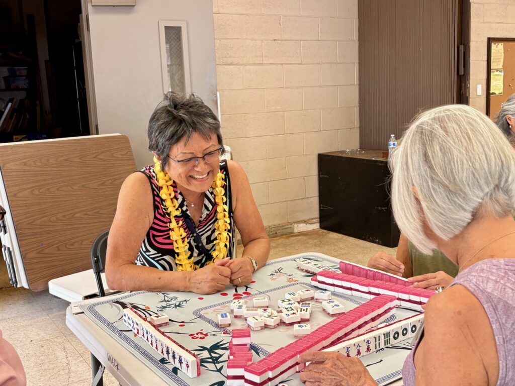 Mahjong instructor May Lau at Kilauea District Park (Denby Fawcett/Civil Beat/2026)